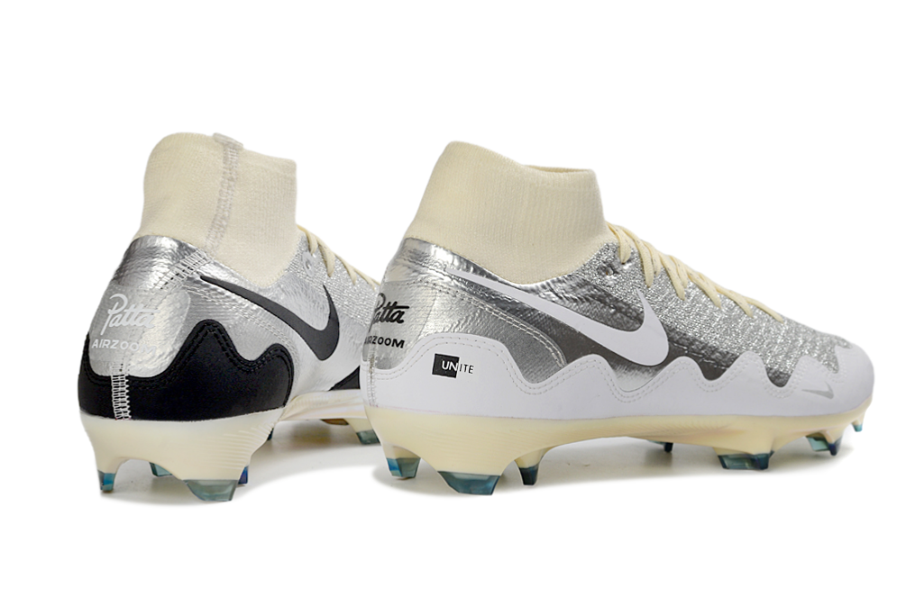 Detailed shot of Nike Air Zoom Mercurial Superfly X Elite FG soccer cleats with White Waves and Patta