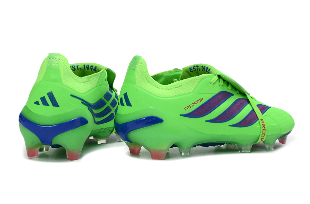 Professional footballer wearing Adidas Predator 26 Elite Tongue FG soccer cleats in a game setting