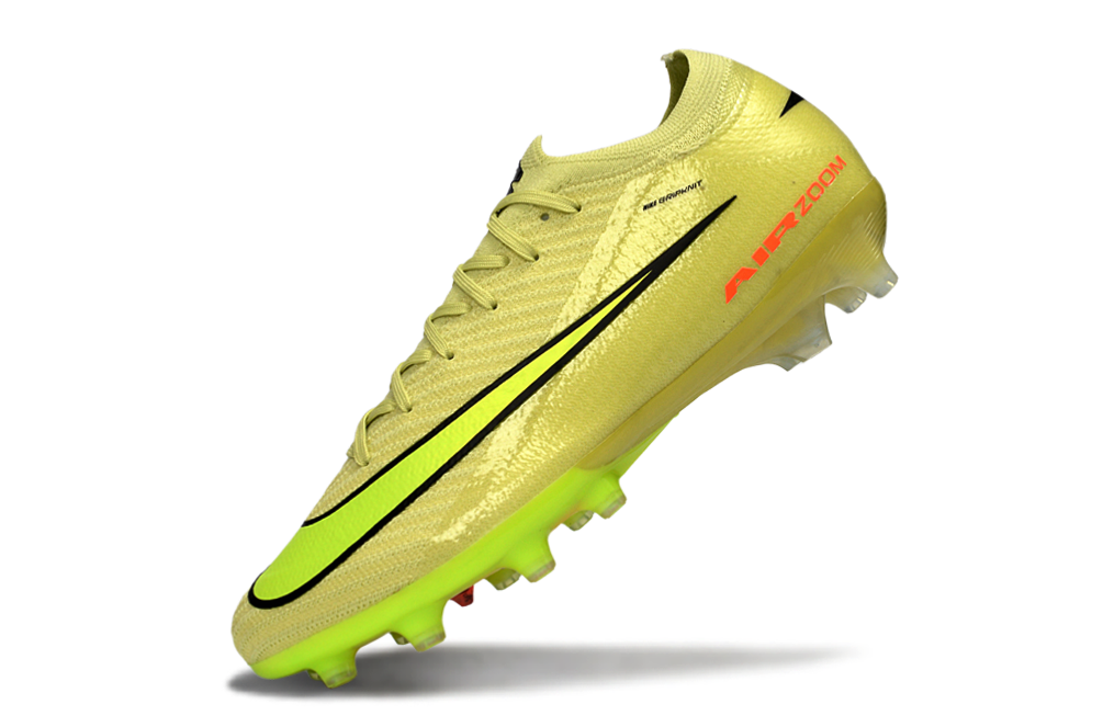 Close-up shot of Nike Mercurial Vapor XVI Elite AG Max Voltage soccer cleats, designed for elite players seeking exceptional 