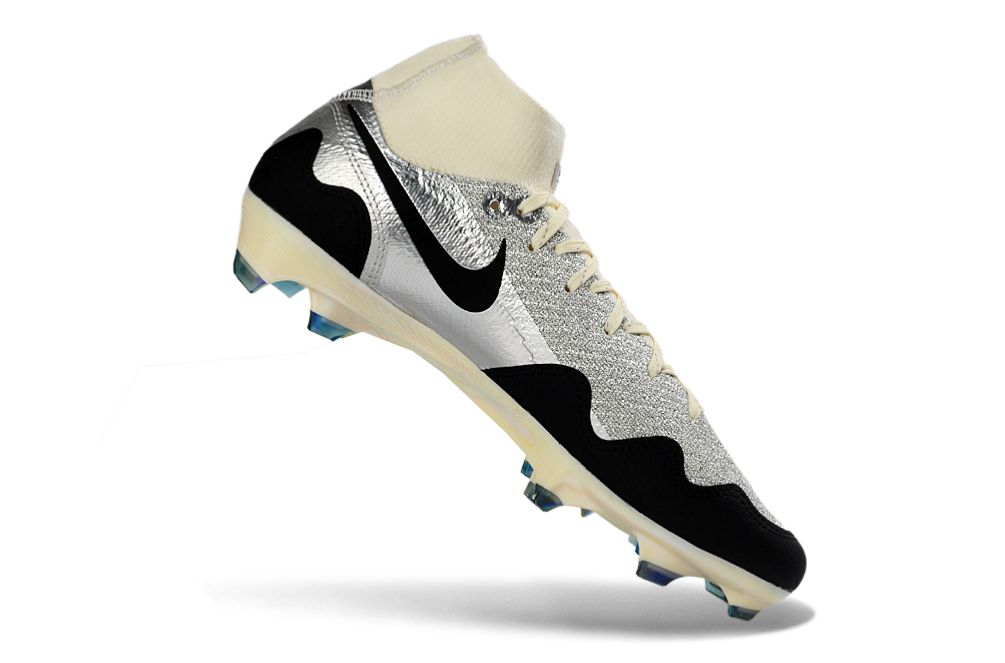 Side view of Nike Air Zoom Mercurial Superfly X Elite FG soccer cleats with White Waves and Patta